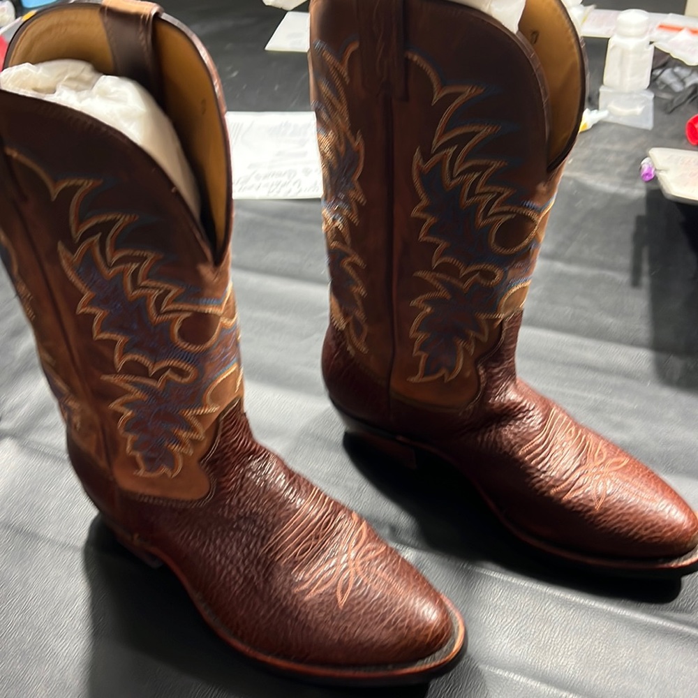 Tony Lama Style 7950.  13” tube, med round toe cognac; 1 7/8” heel